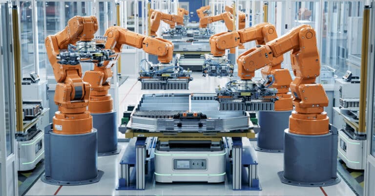 EV battery pack automated production line equipped with orange advanced robotic arms.
