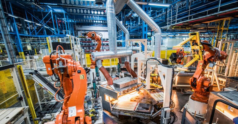 Robotic arms in a household appliances factory.