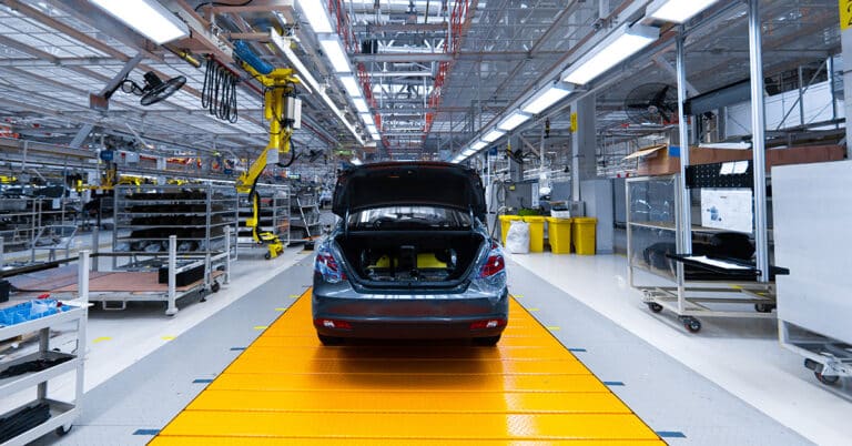 Movement of vehicles along the production line at the plant. Car assembly.